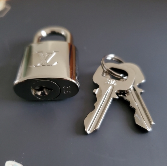 Authentic Louis Vuitton Lock - Picture 2 of 2